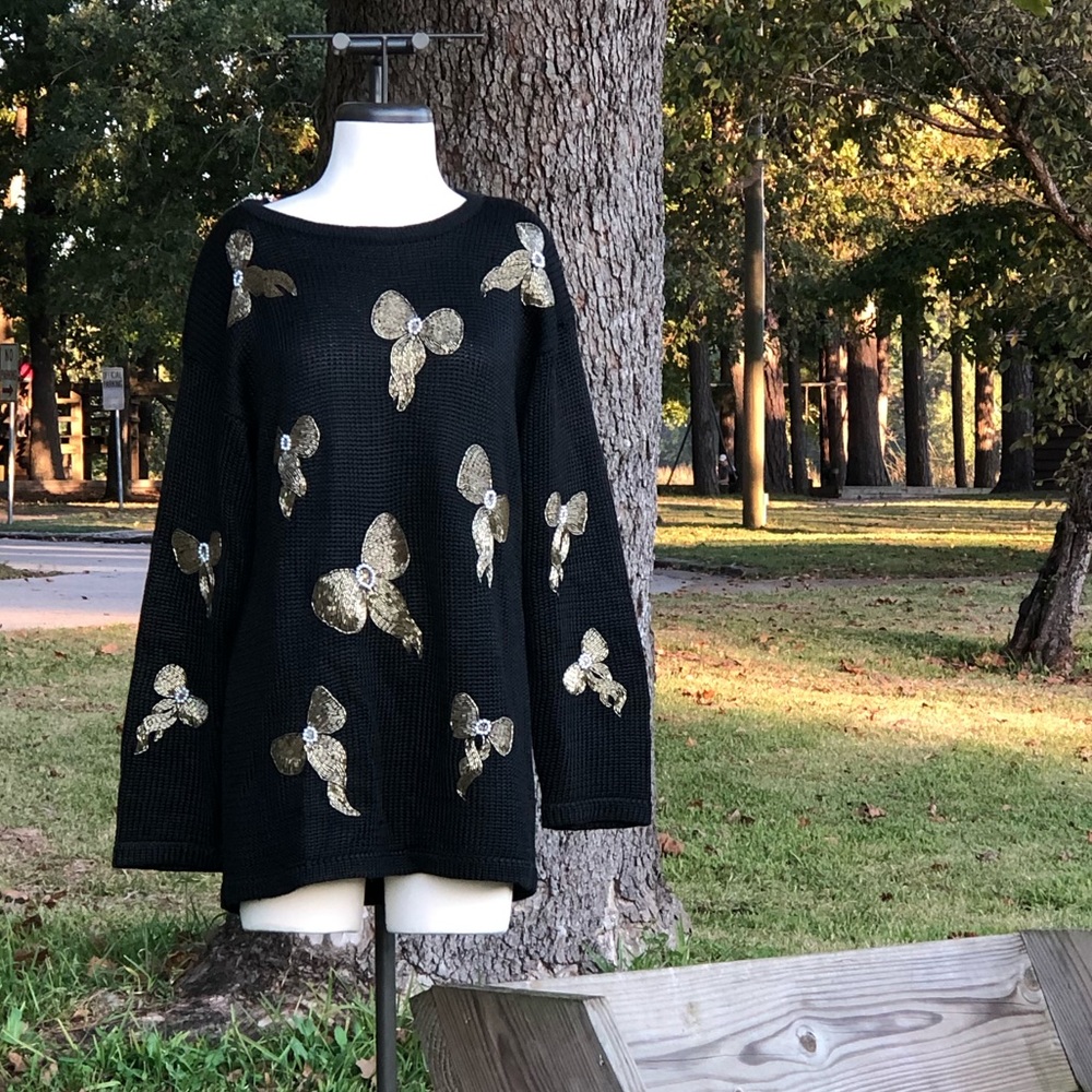 Black jumper/sweater w/ gold beaded bows
